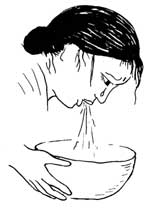 A woman vomiting due to morning sickness