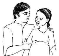 A woman and her husband discuss postnatal care and future childcare issues