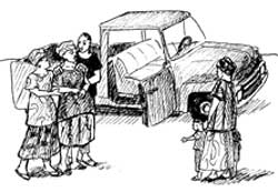 Two family members escort the woman in labour to a truck in order to take her quickly to a health facility.