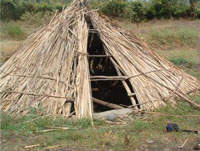 A pond that has been shaded by local materials.