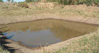 A water source with steepened shorelines.