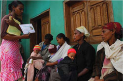 A health worker collecting health data