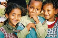 Three smiling children.
