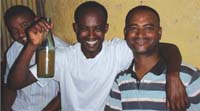 Three men drinking alcohol together.