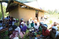 A womans group sitting together.